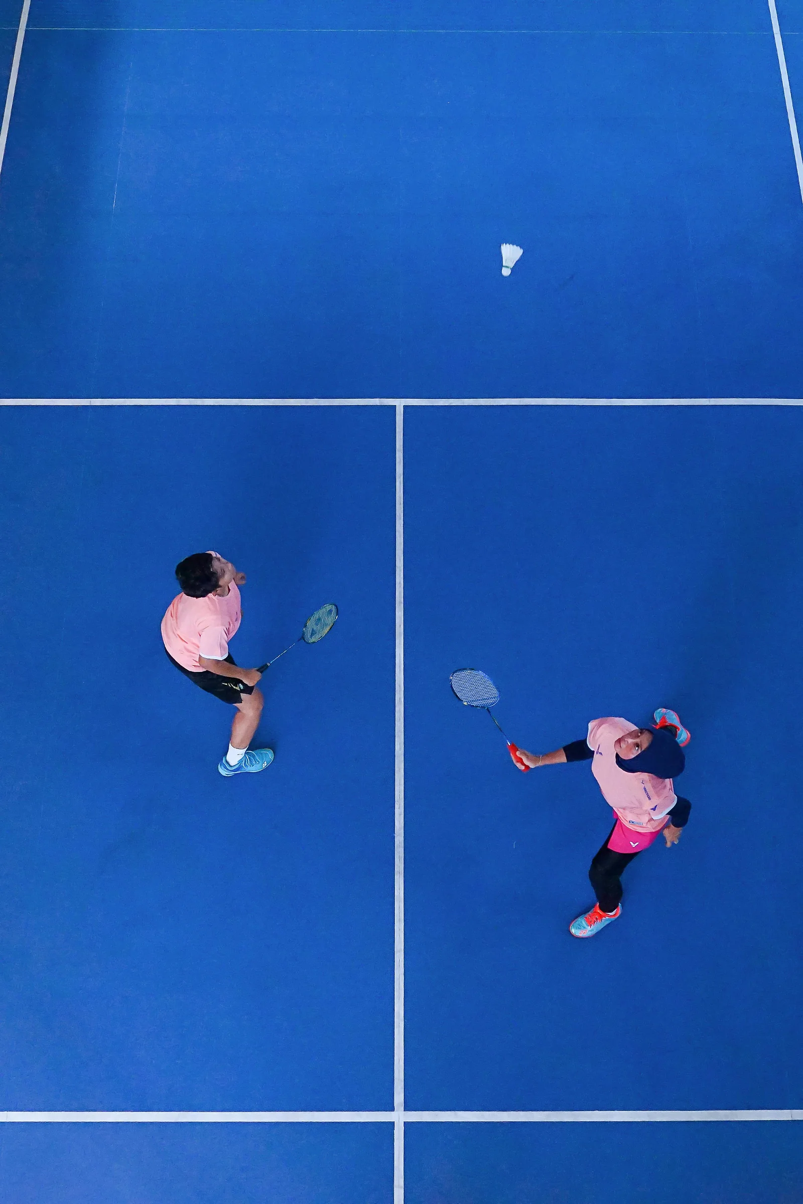 Badminton player in match showing clutch performance characteristics